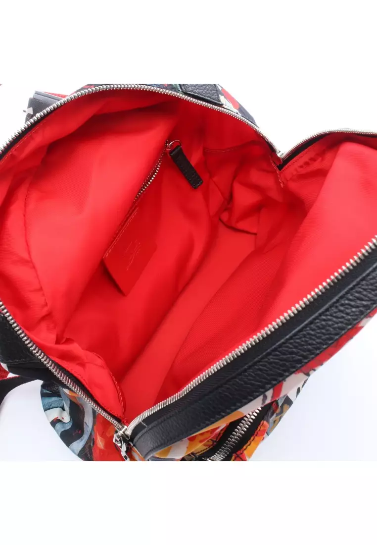 Pre-Loved CHRISTIAN LOUBOUTIN BACKLOUBI SMALL Backpack rucksack Nylon leather rubber black Red multicolor