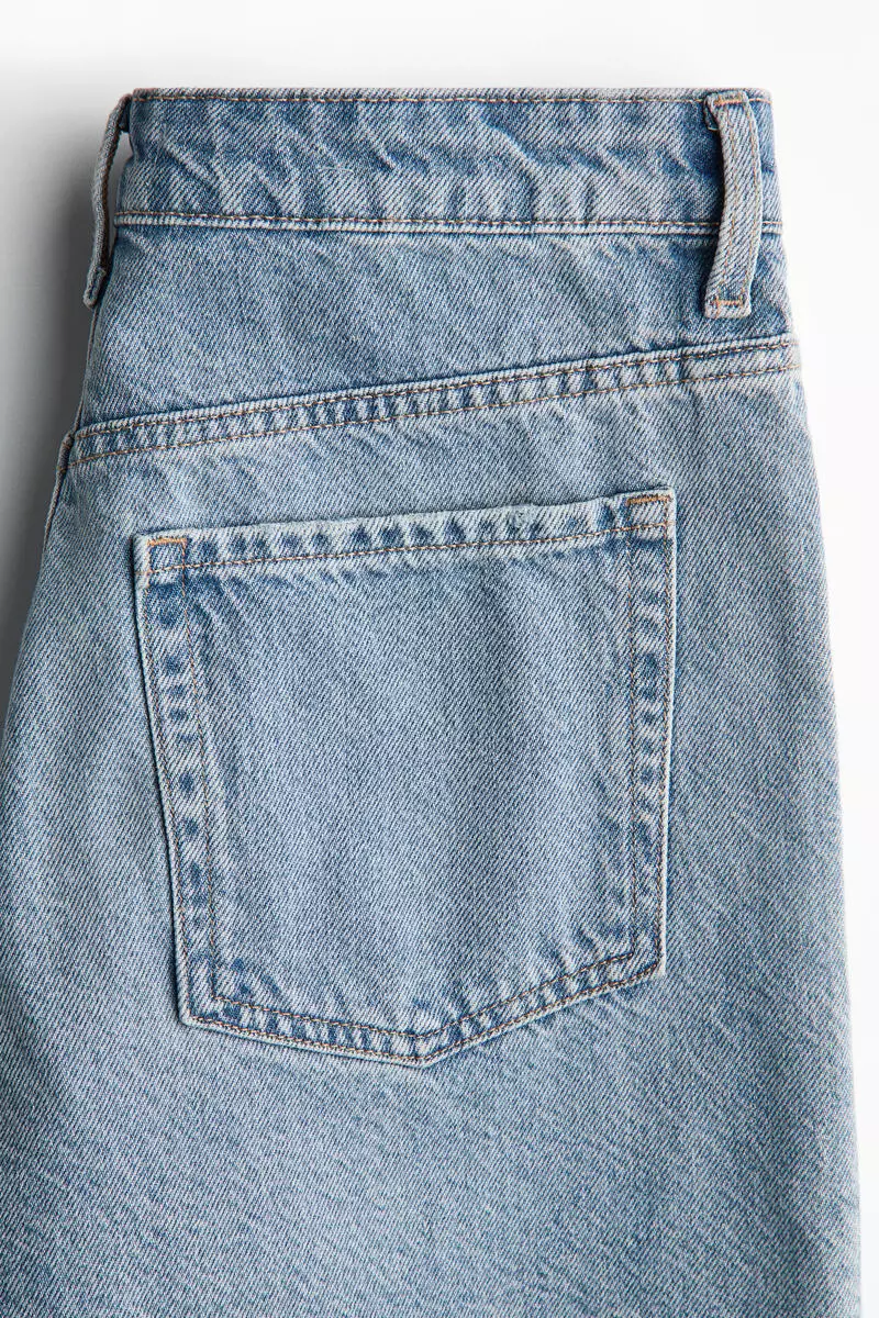 Raw-edge denim shorts