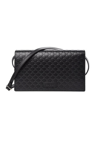 Gucci black GUCCI Unisex Black Microguccissima GG Logo Leather Wallet On Strap Small Crossbody With Leather Logo Tab Black 466507 C14DFAC898D888GS_1