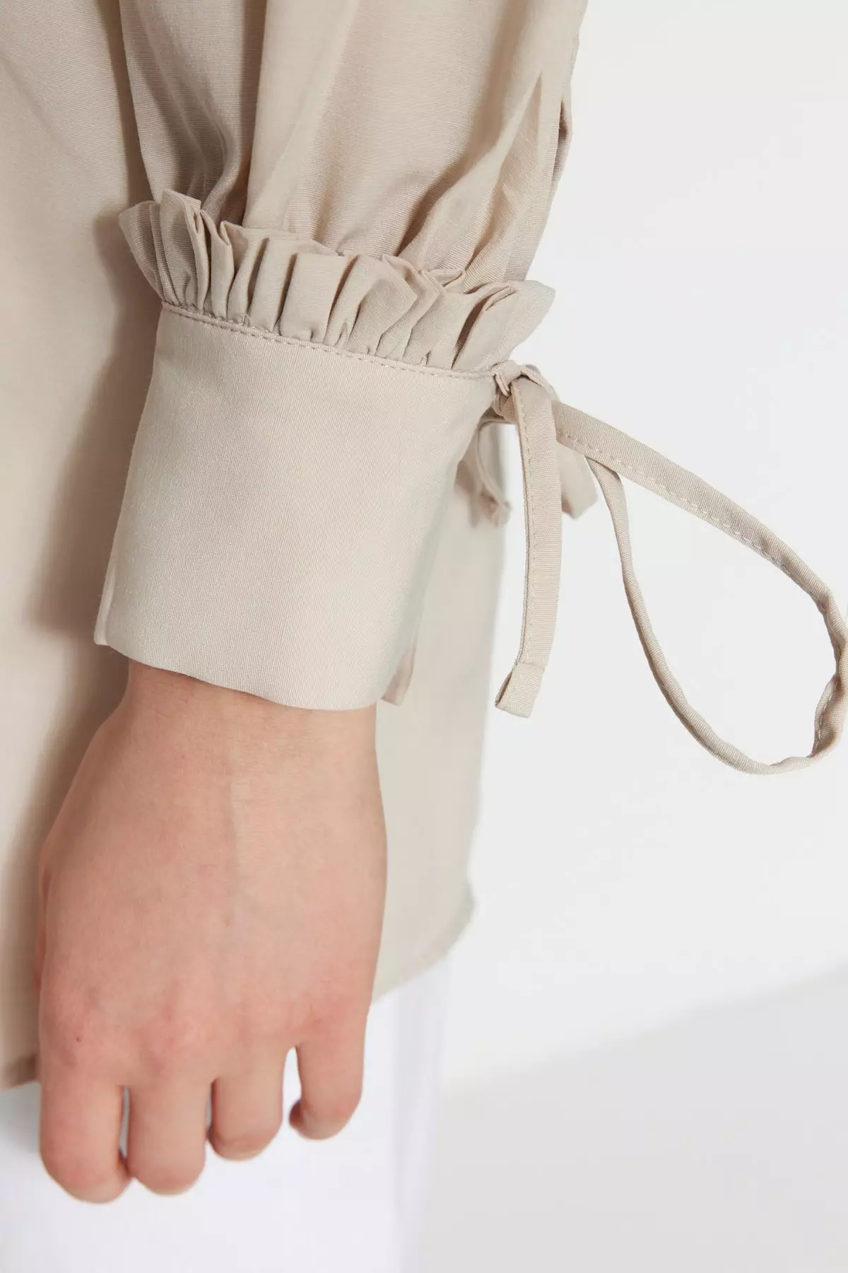 Woven Tunic with Ruffle Shoulder and Cuff