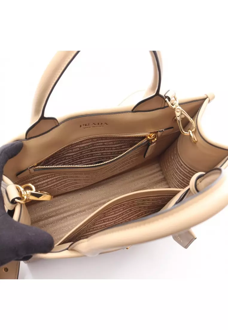 Pre-Loved Prada symbol Topstitching SOFT CALF Handbag tote bag leather beige
