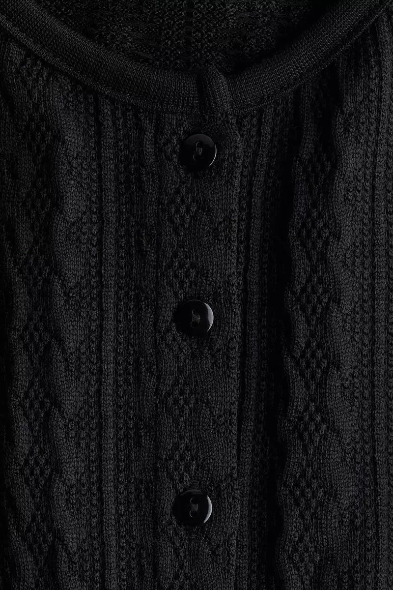 Cable-knit frill-trimmed cardigan