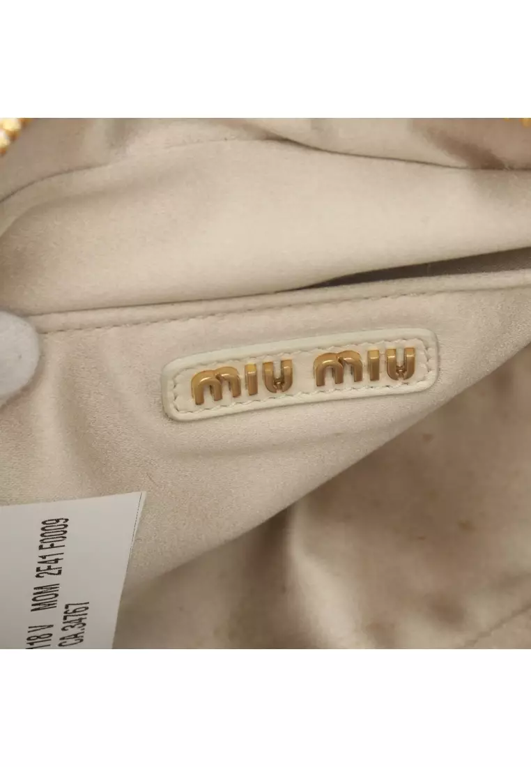 Fake miu miu best sale