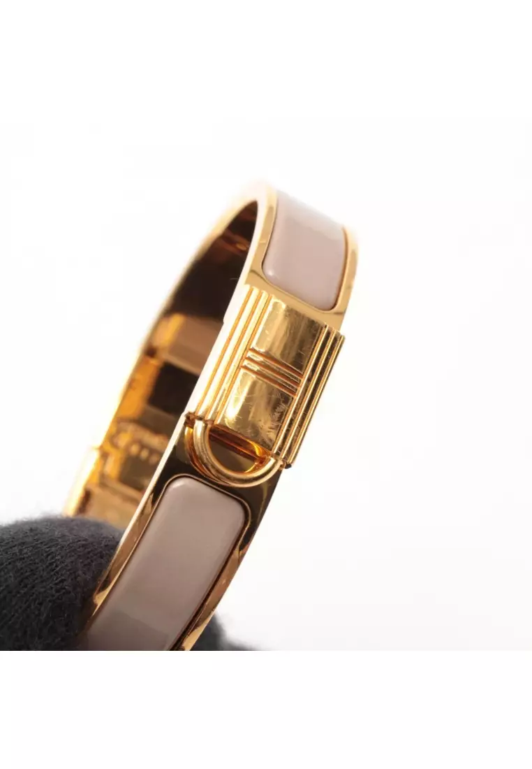 Pre-Loved Hermès Click Cadena PM bangle GP gold beige