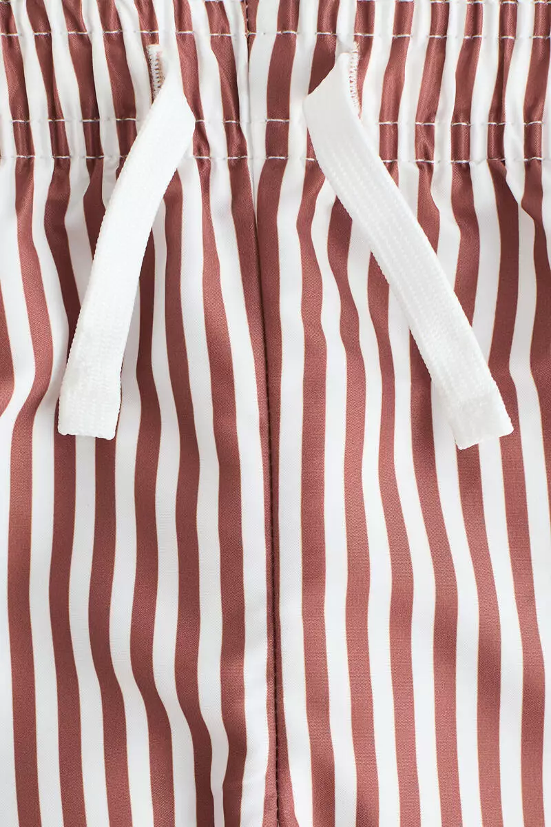 Patterned swim shorts