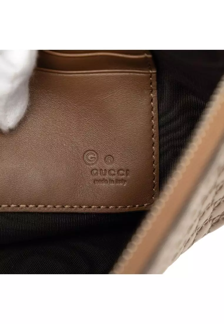 Pre-Loved Gucci Microguccissima Clutch