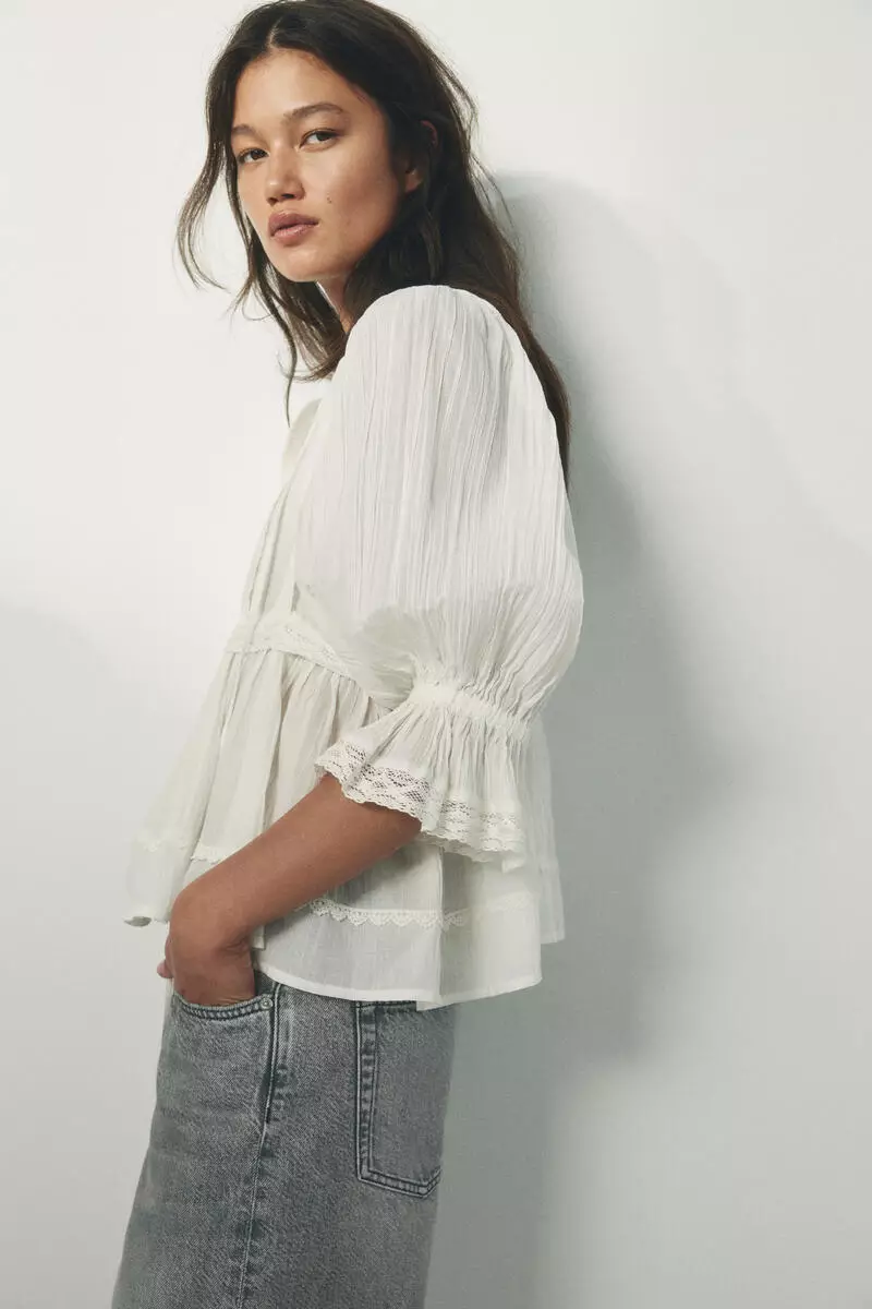 Lace-trimmed cotton blouse