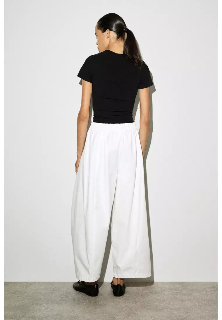 ELASTICATED BARREL-LEG TROUSERS