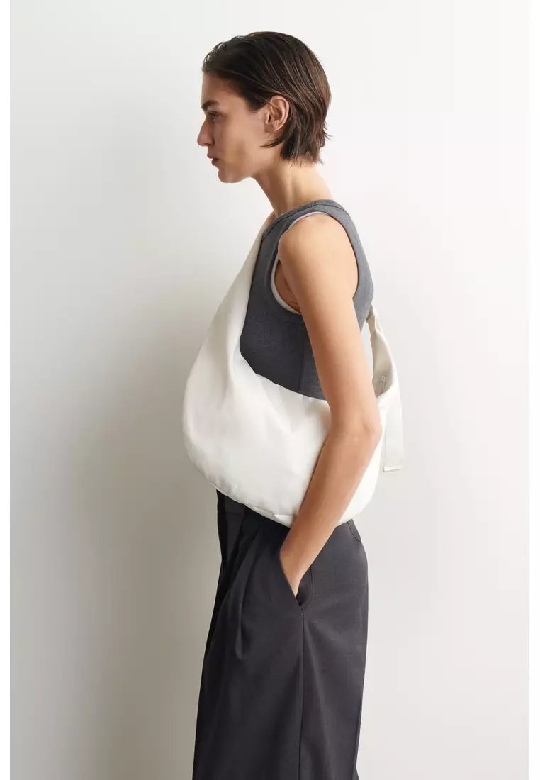 CURVED CROSSBODY BAG - CRINKLED-SHELL