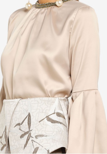 Buy Flared Blouse With Peplum Skirt from Ezzati Amira in Beige only 579