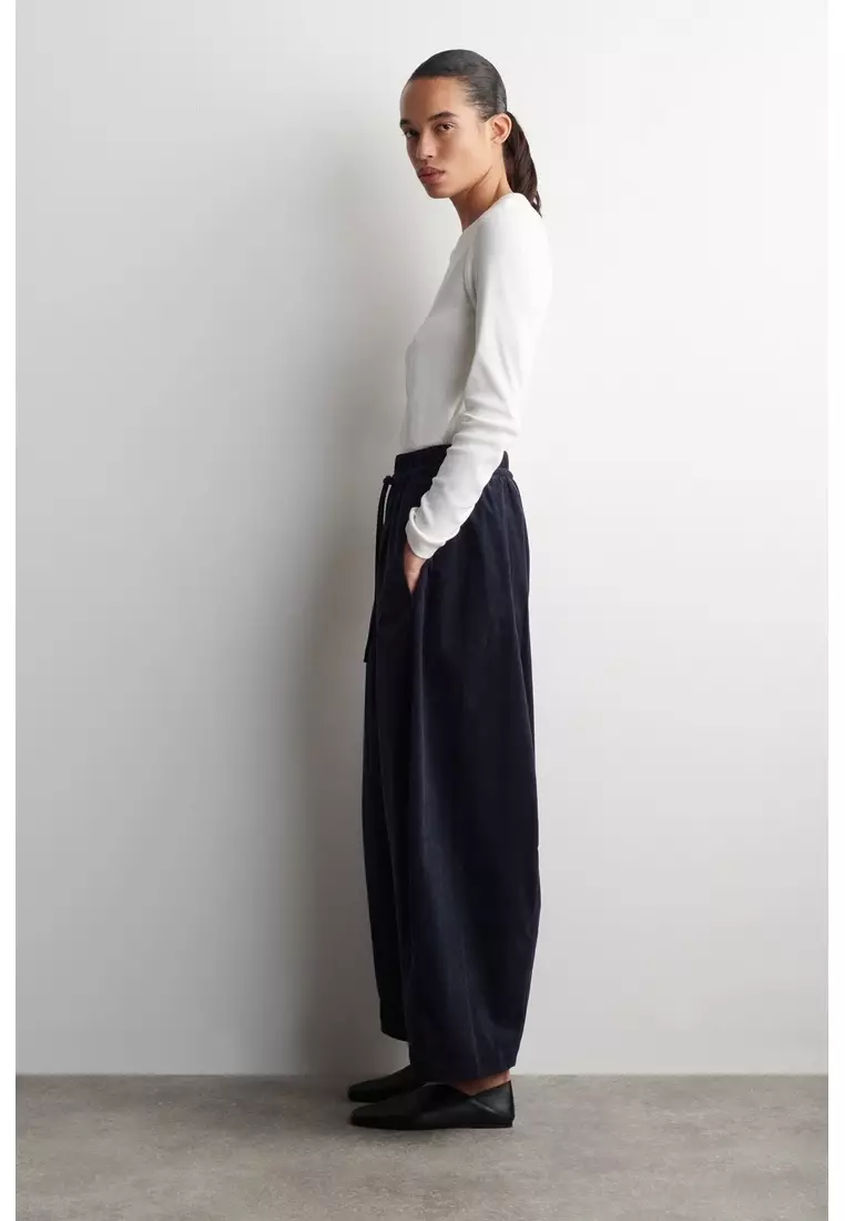 ELASTICATED CORDUROY BARREL-LEG TROUSERS