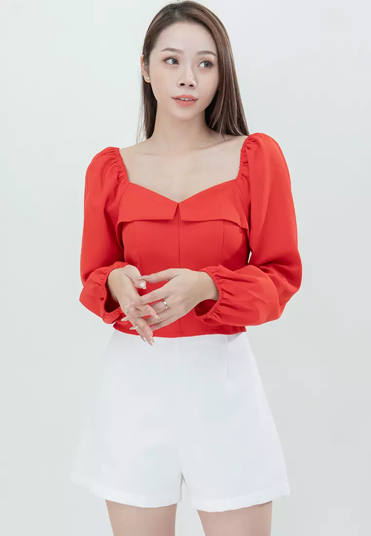 露腰感修身长袖上衣