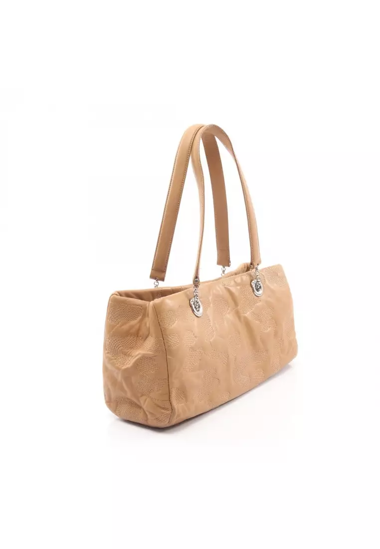 Pre-Loved Cartier panthère Handbag leather beige