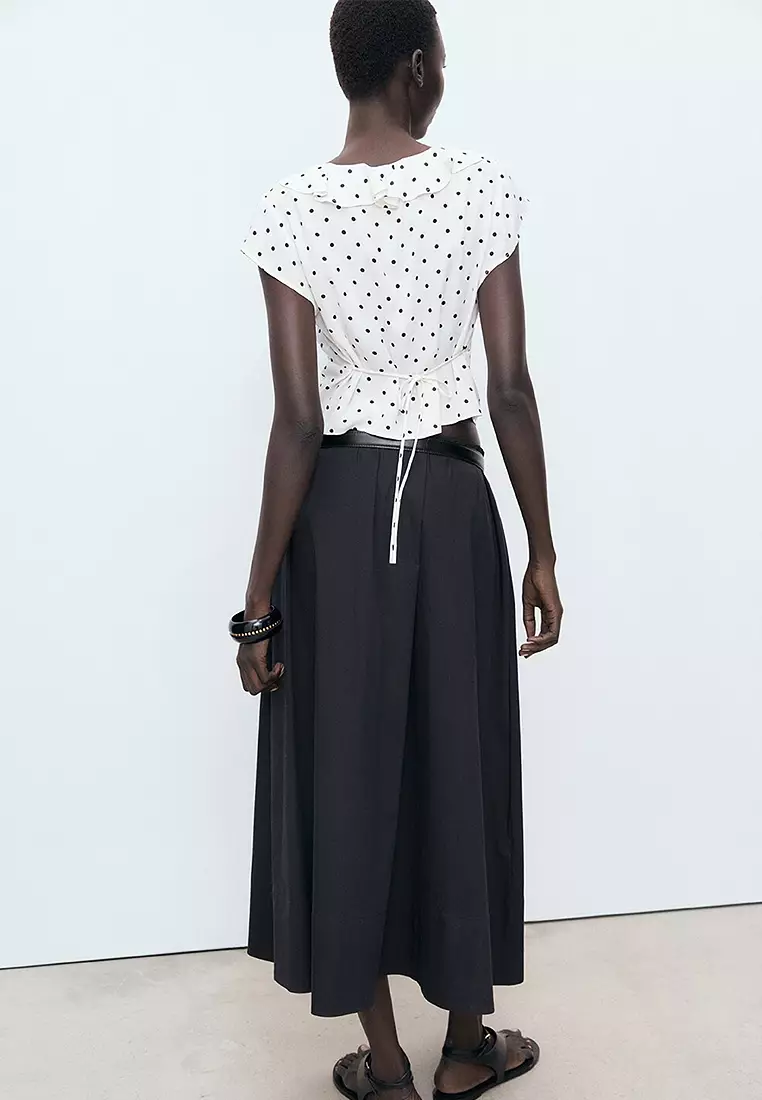 Polka-Dot Blouse With Ruffles
