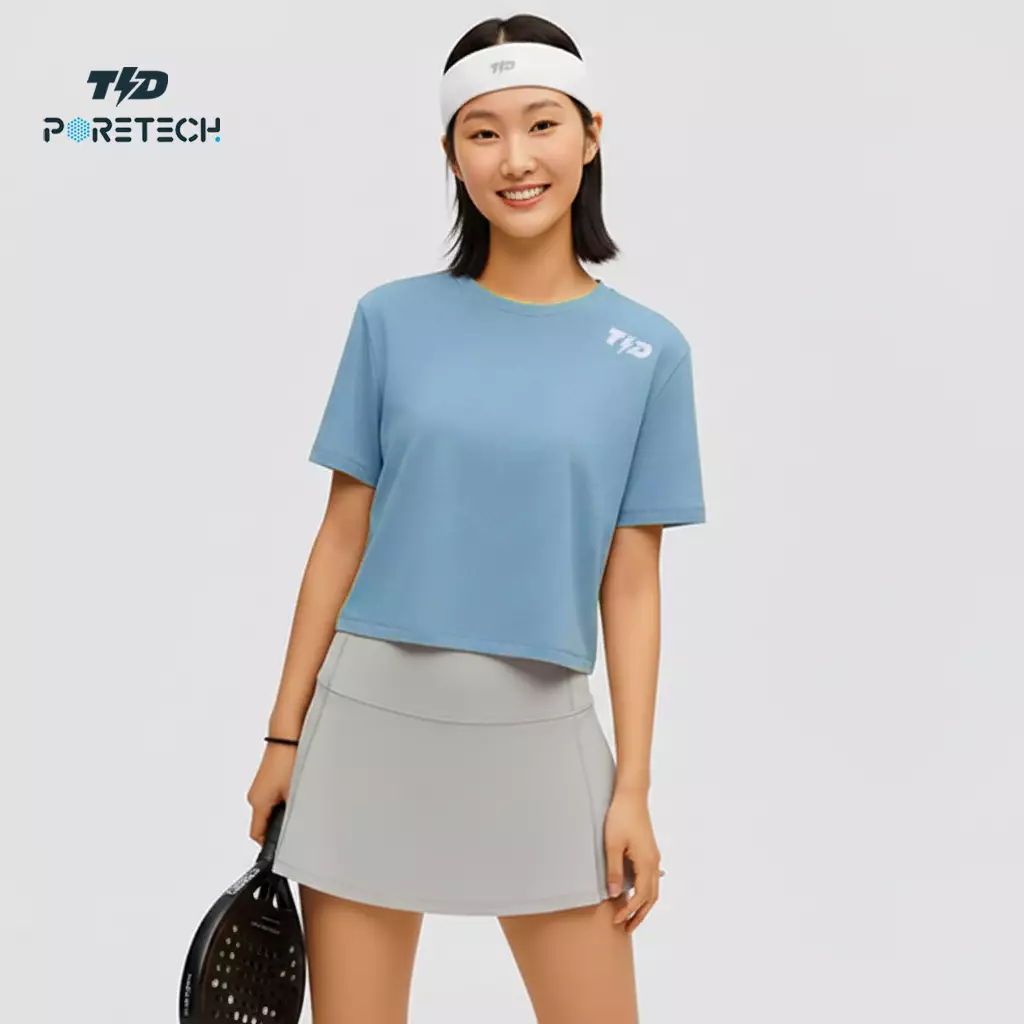 TDACTIVE Baju Jersey Padel Crop Top Wanita biru muda PORETECH drifit LSF32