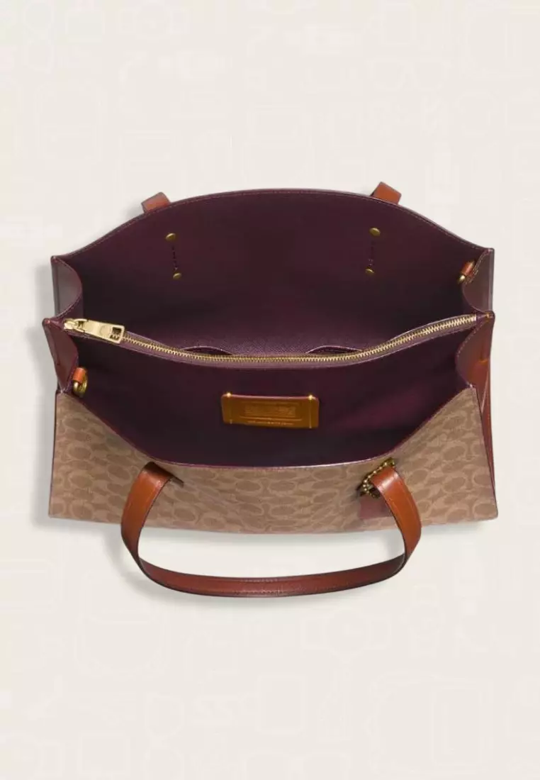 Charlie carryall 40 in signature canvas discount