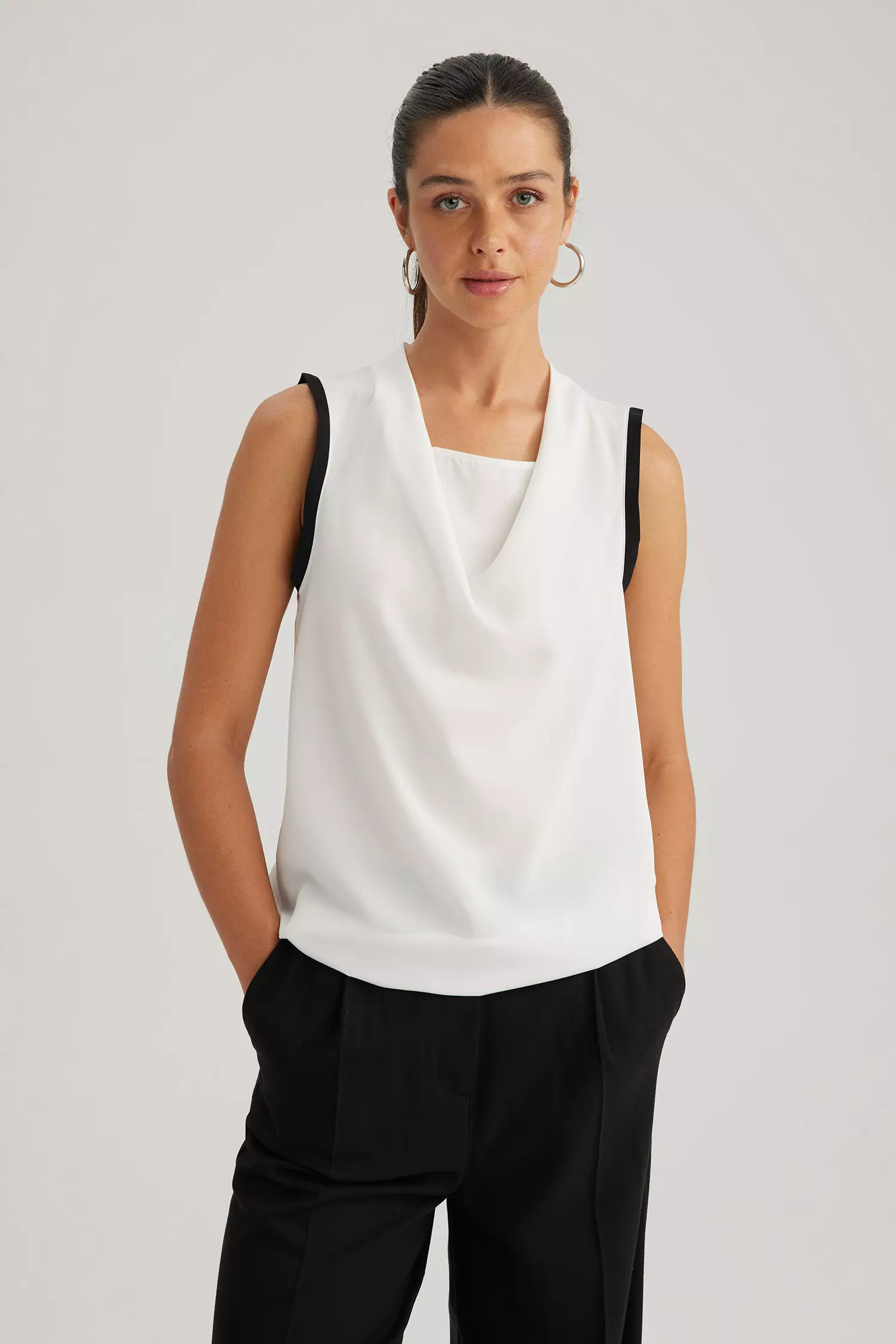 White high neck sleeveless blouse sale