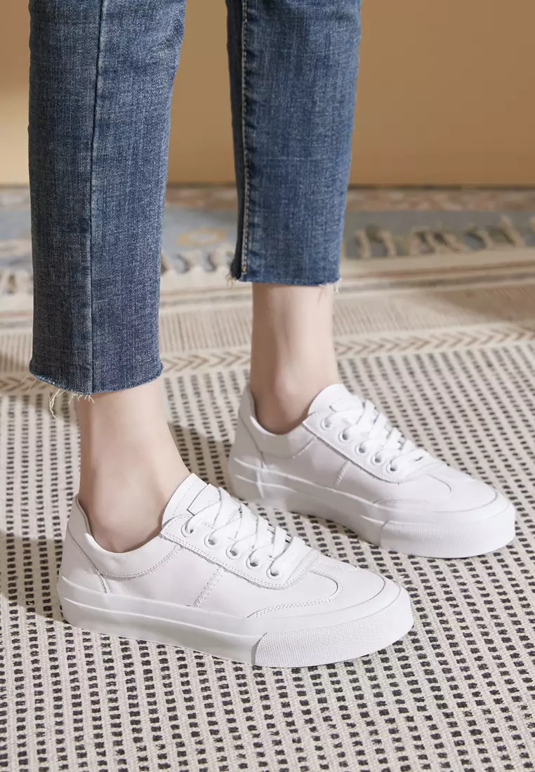 White canvas lace up sneakers store