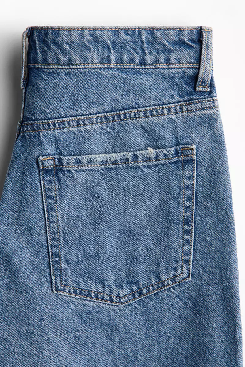 Raw-edge denim shorts
