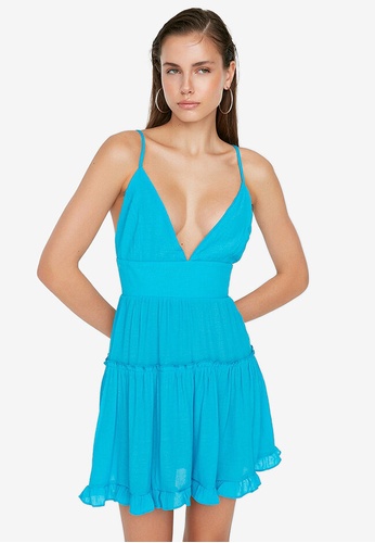 17 Low-Cut Dresses You Can Wear to Brunch, the Beach and More