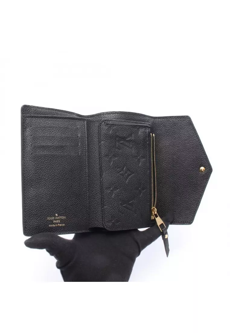 Pre-Loved Louis Vuitton Portefeuille Curieuse compact Monogram Empreinte Noir trifold wallet leather black