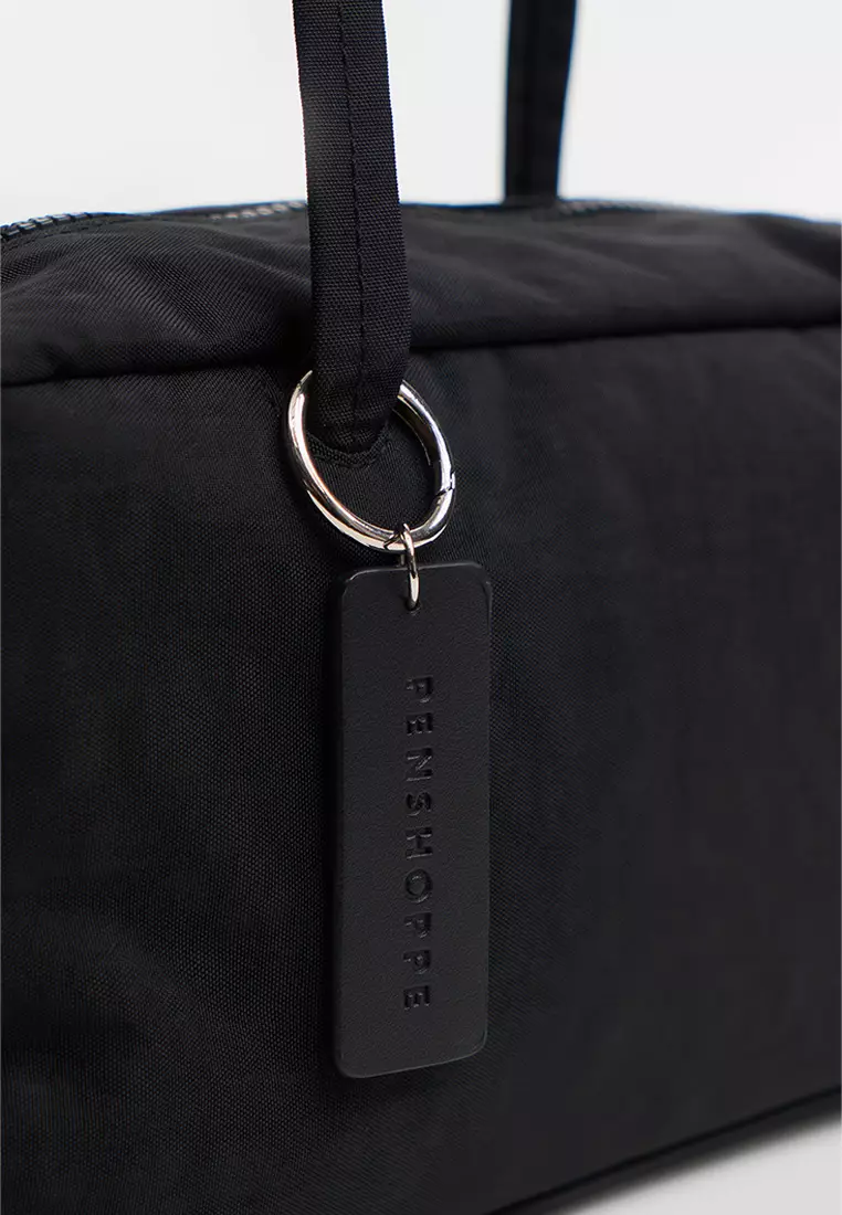 Nylon Bowler Shoulder Bag with Leather Charm Branding