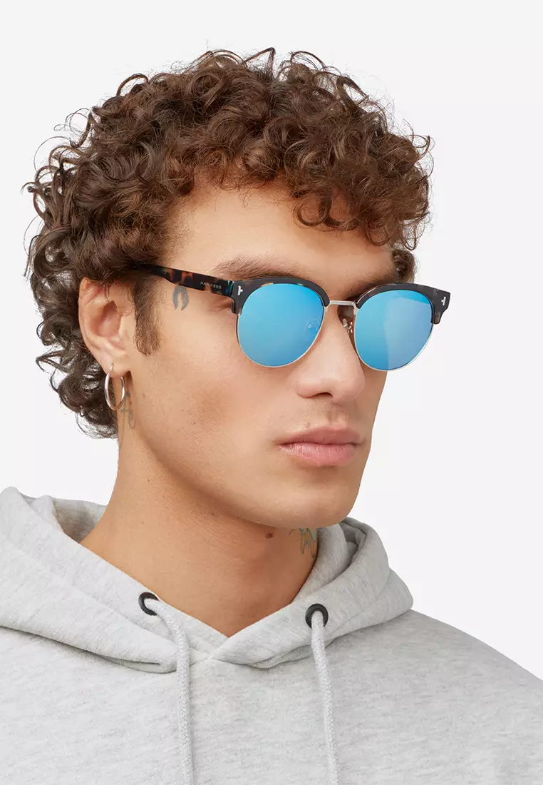 HAWKERS POLARIZED Blue NEW CLASSIC ROUNDED Sunglasses for Men and Women, Unisex. UV400 Protection. Official Product designed in Spain
