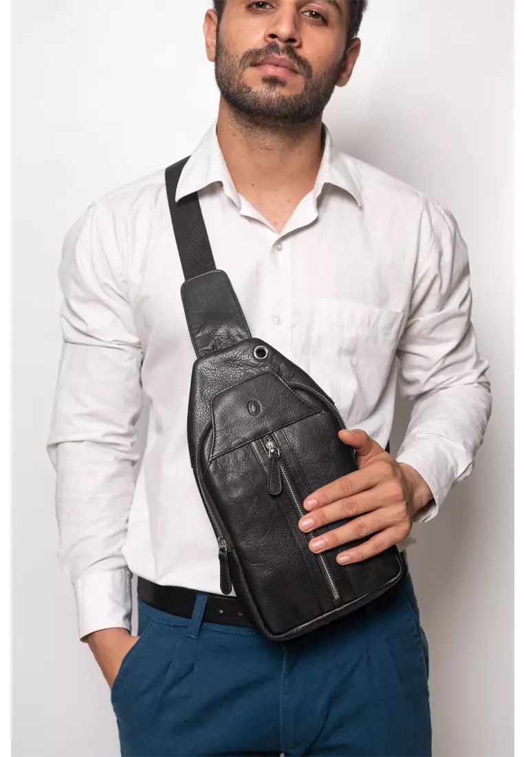 black leather sling backpack