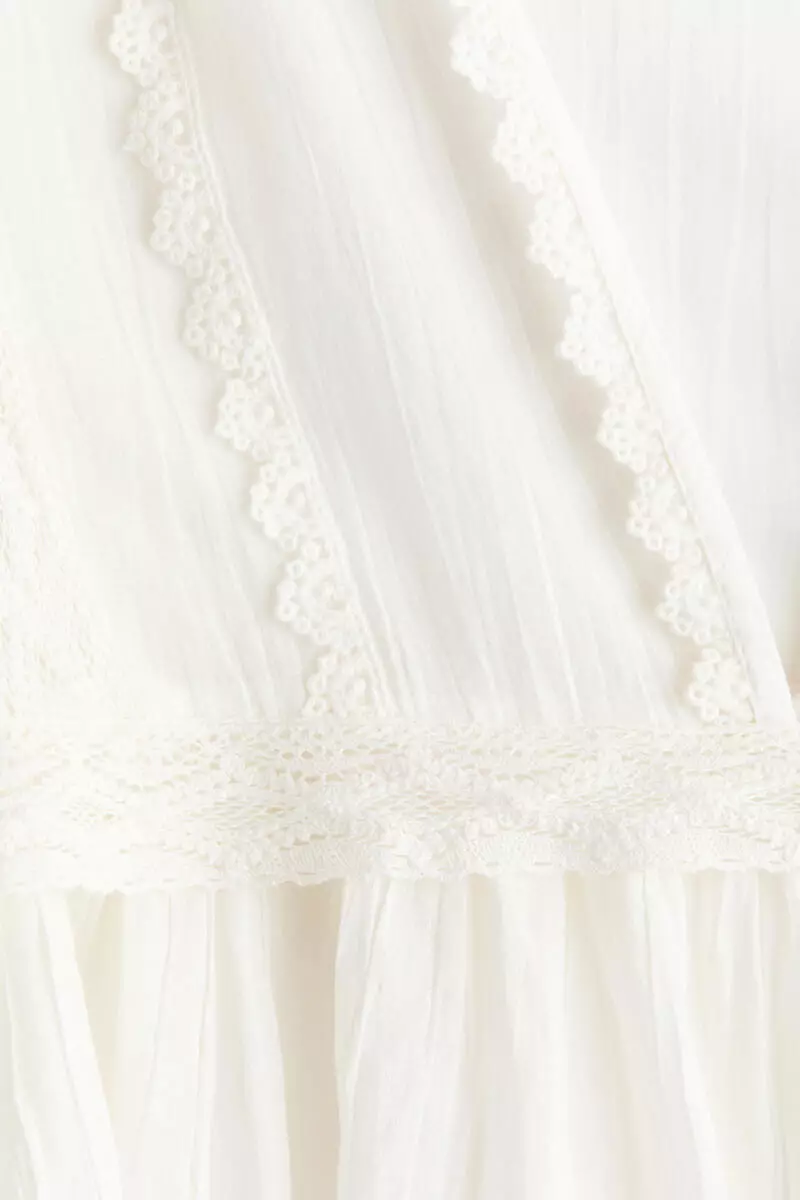 Lace-trimmed cotton blouse