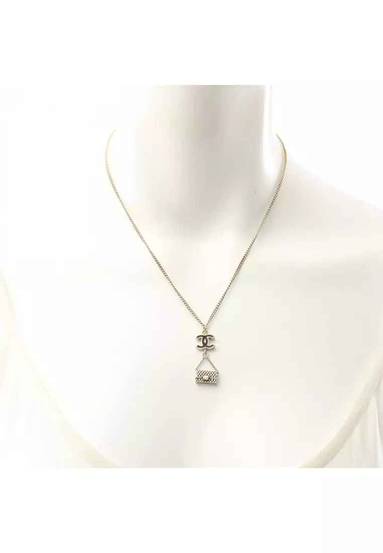 Pre-Loved Chanel coco mark matelasse necklace GP gold black 09P