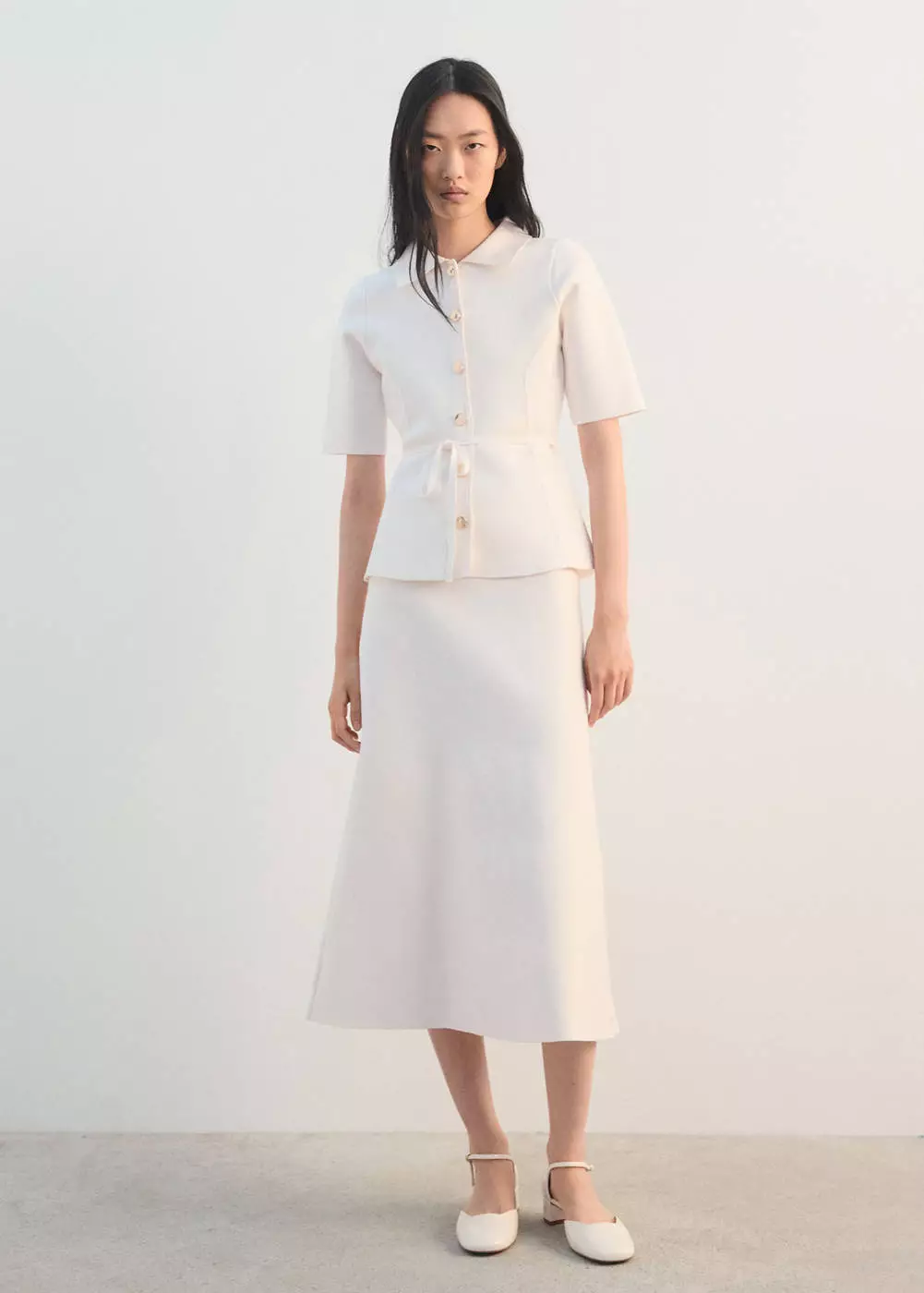 Jaket rajut dengan kerah kemeja