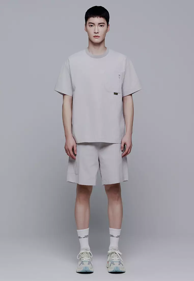 Unisex FIOTOS Woven Sleeve Pocket Stretch Short Sleeve Tee