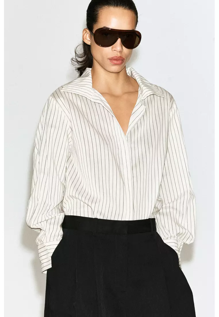 RELAXED FLUID WIDE-LEG TROUSERS