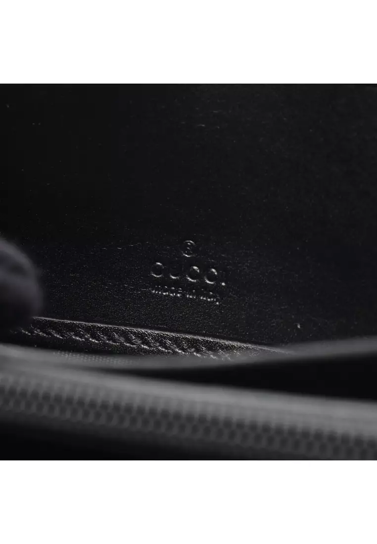 Pre-Loved Gucci GG Imprime round zipper long wallet Coated canvas leather black