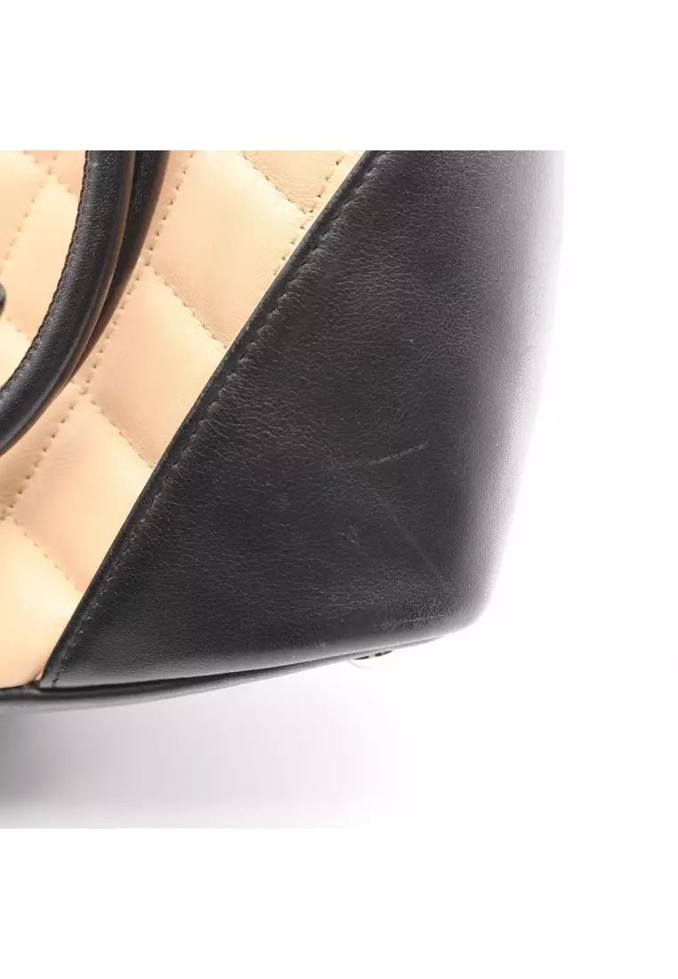 Pre-Loved Chanel Cambon line Small Handbag tote bag leather beige black silver hardware