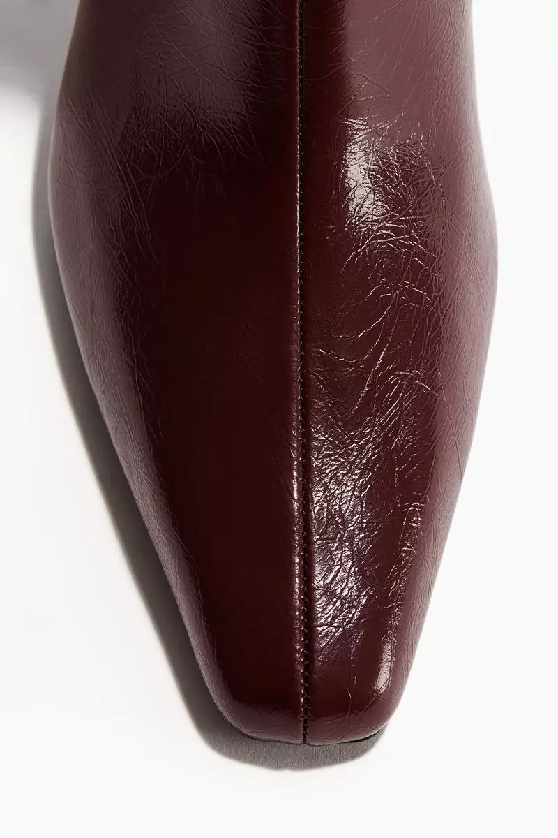 Heeled knee-high boots