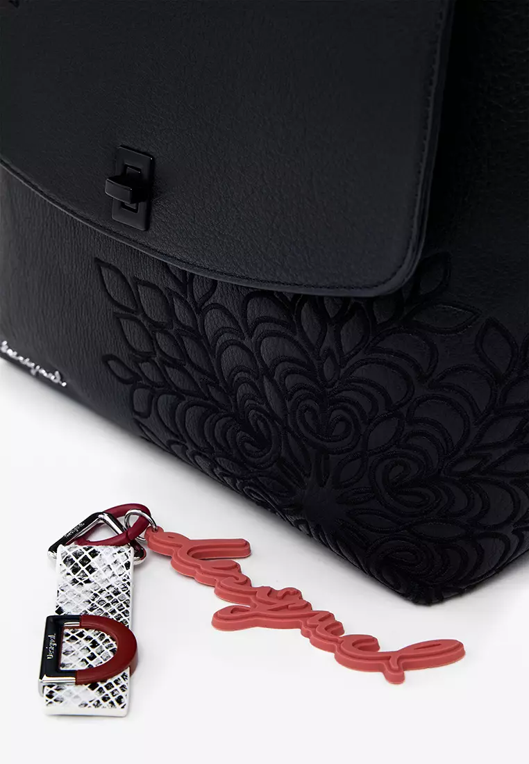 Small embossed flap backpack