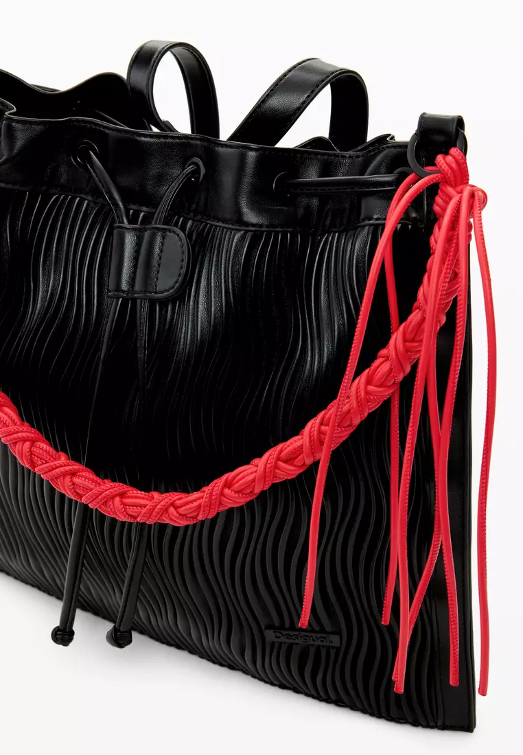 Medium embossed backpack