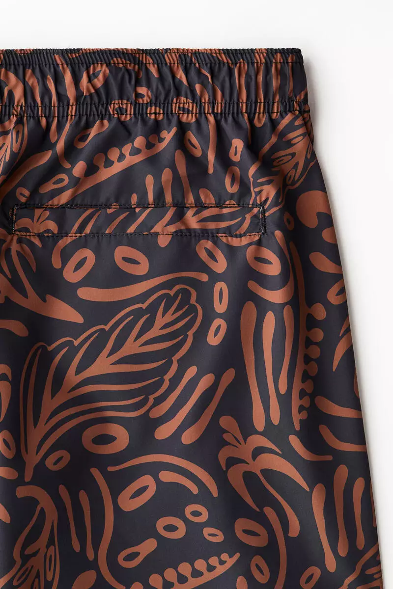 Patterned swim shorts
