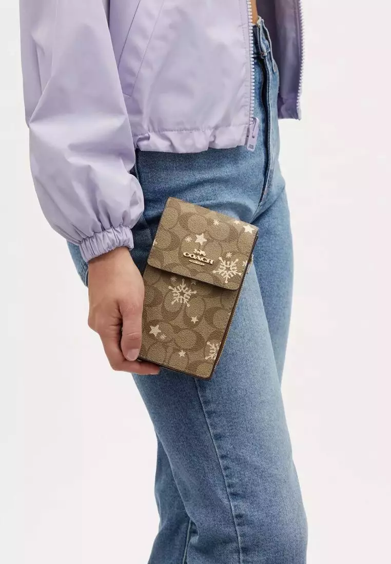 Coach North South Phone Crossbody In Signature Canvas With Star And Snowflake Print Khaki Saddle Gold Multi