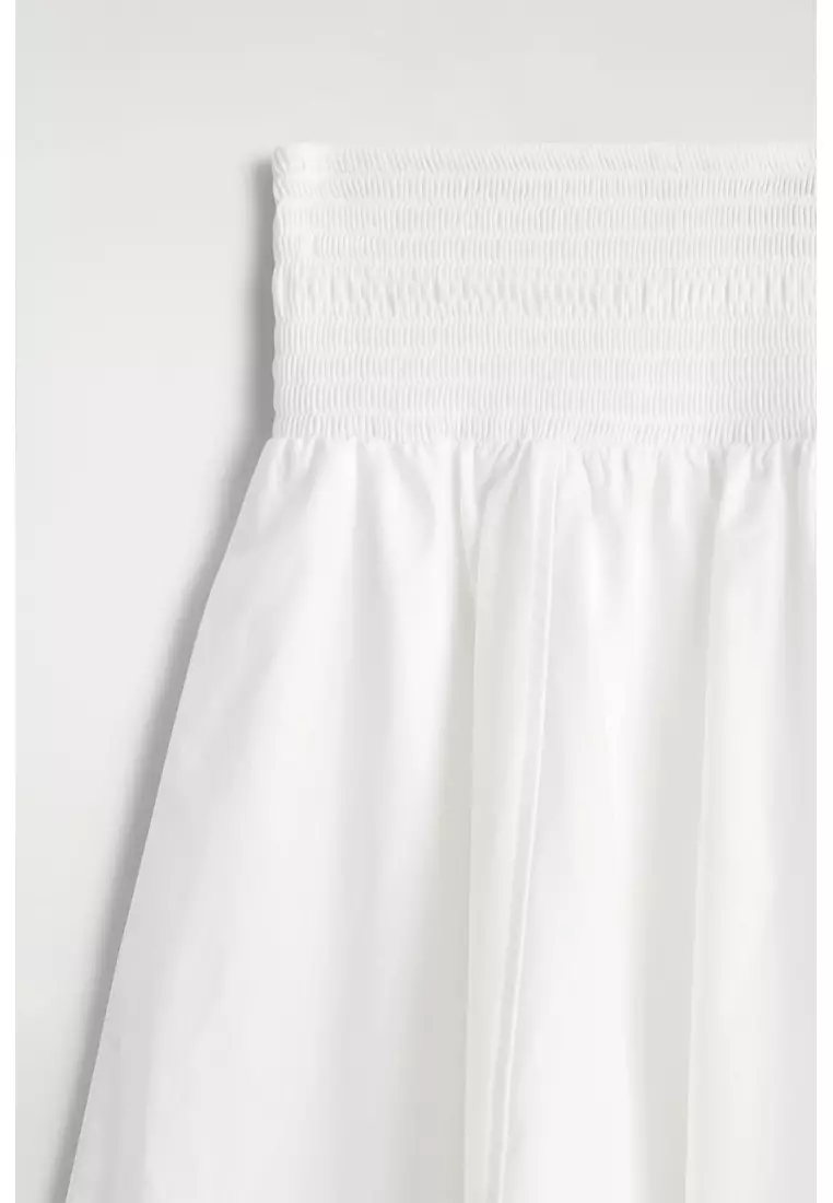 SMOCKED PANELLED MIDI SKIRT