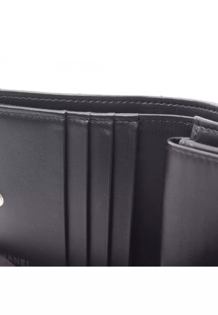 Pre-Loved Chanel matelasse Bi-fold wallet leather black silver hardware