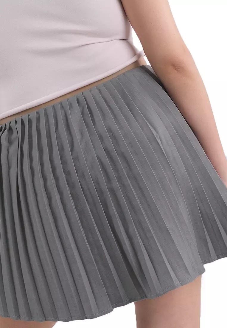 Mini Skirt With Side Pleats And Tie Detail