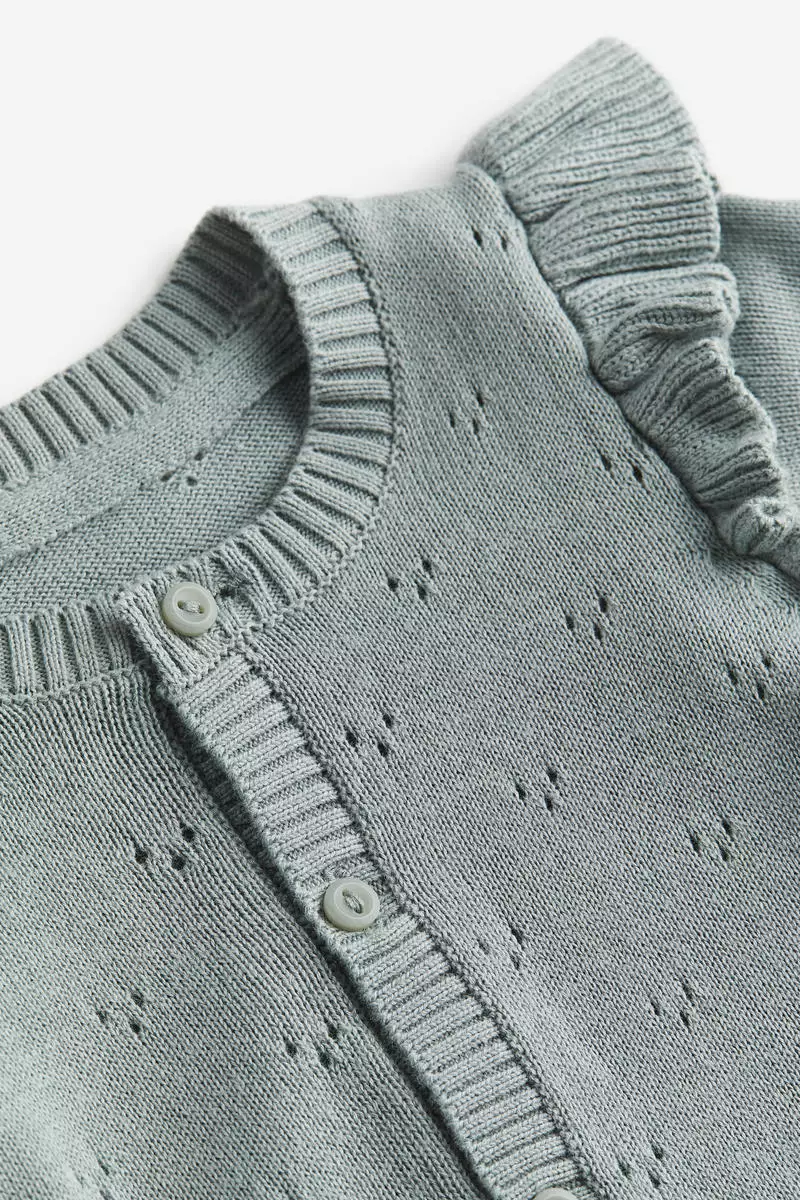Knitted cotton romper suit
