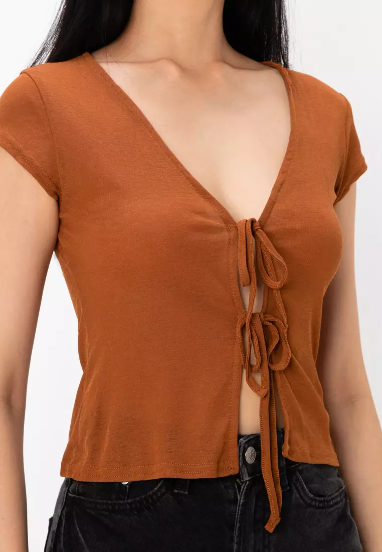 Buy ASOS Design Tie Front Short Sleeve Top In Slinky Mesh Online