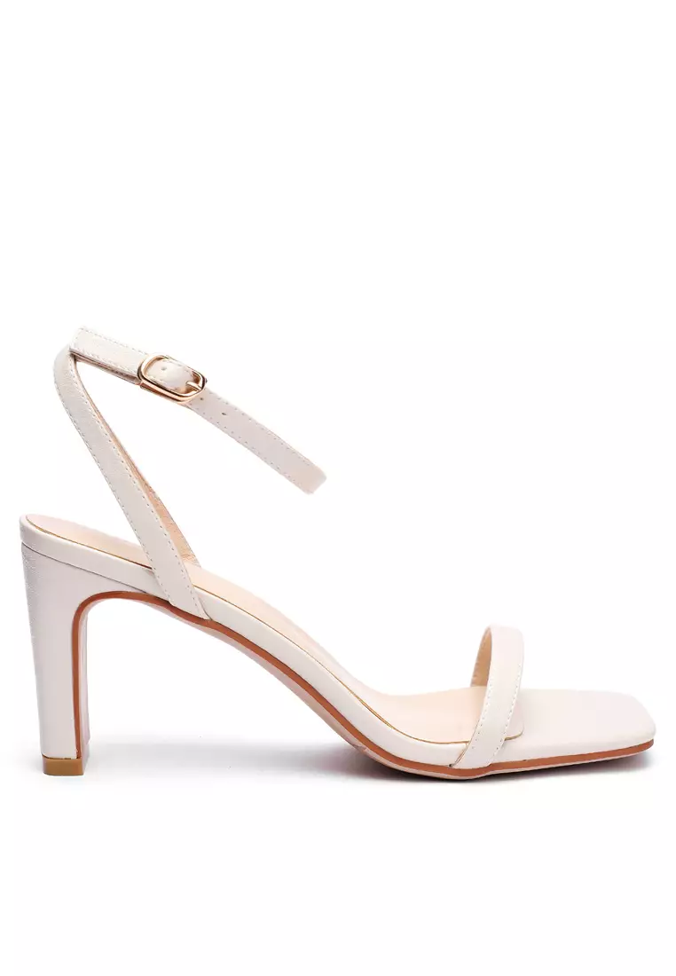 White sandals top 1 inch heel