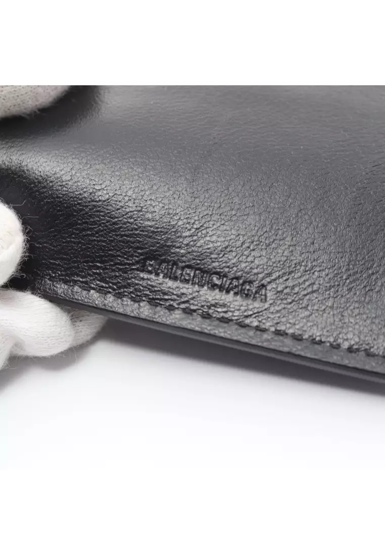 Pre-loved BALENCIAGA CASH MINI WALLET cache mini wallet trifold wallet  leather black white