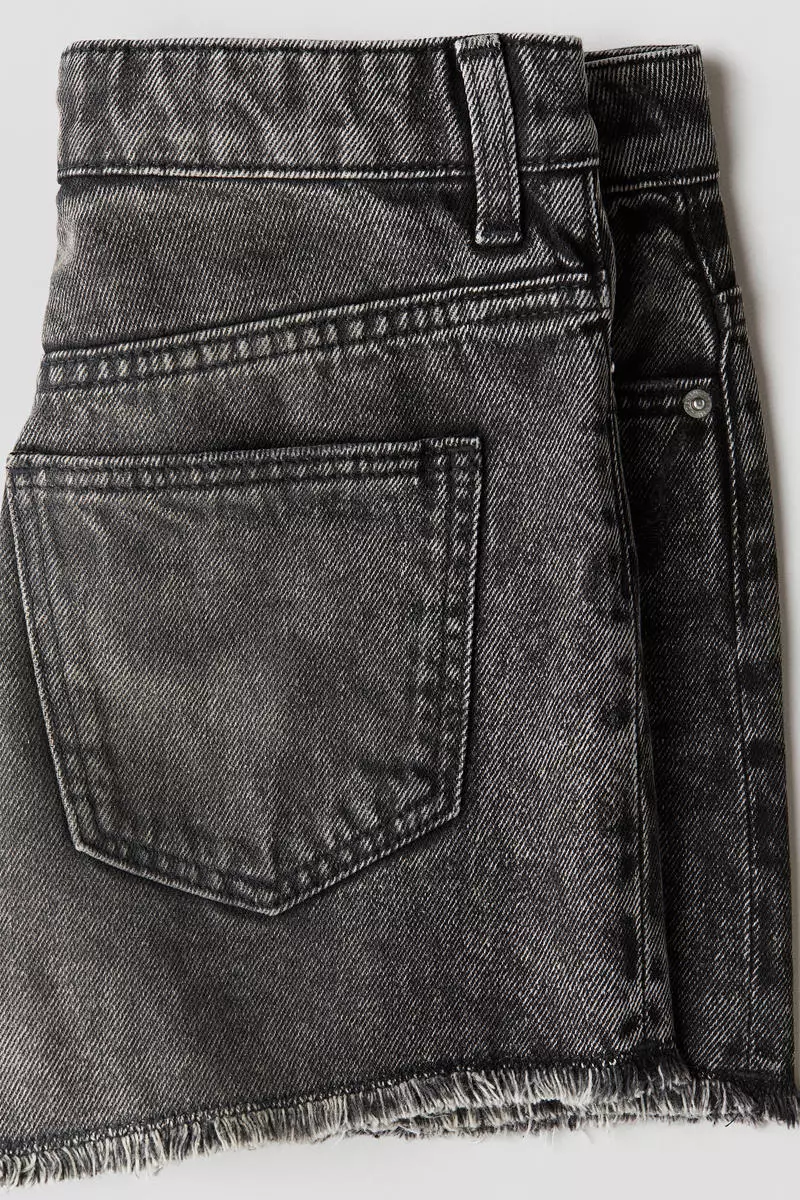 Raw-edge denim shorts