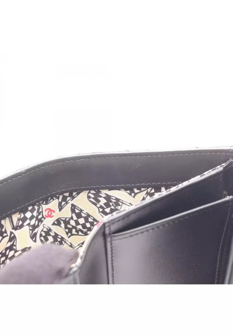 Pre-Loved Chanel matelasse trifold wallet Caviar skin black gold hardware