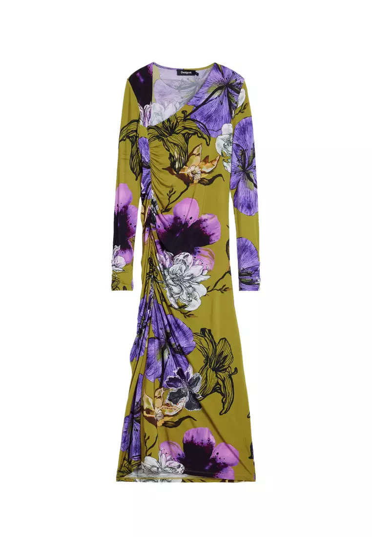 Asymmetric neckline dress designed by Mr. Christian Lacroix